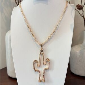 Laura Ford Goldtone Cactus Pendant & cream beveled shiny beads long necklace